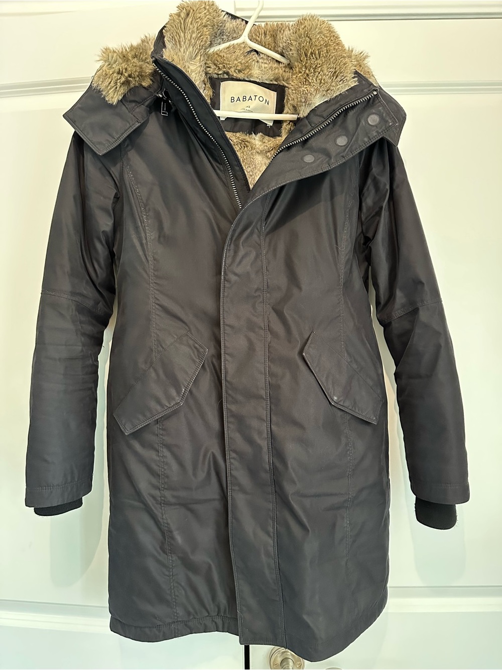 Babaton black down-filled parka with faux-fur lined hood and body. Size XS